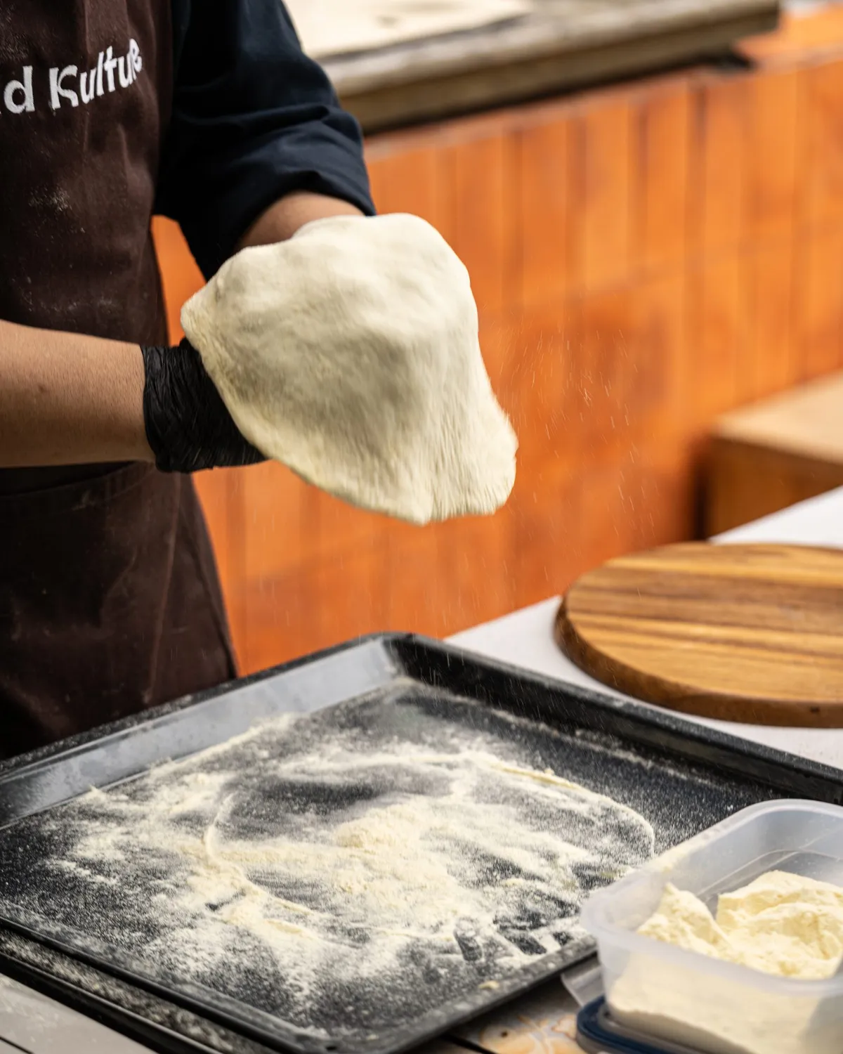 Chef preparing fresh ingredients at Kynd Kulture